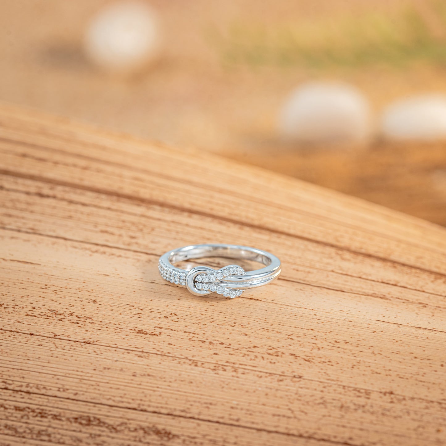 The Infinity Knot Ring
